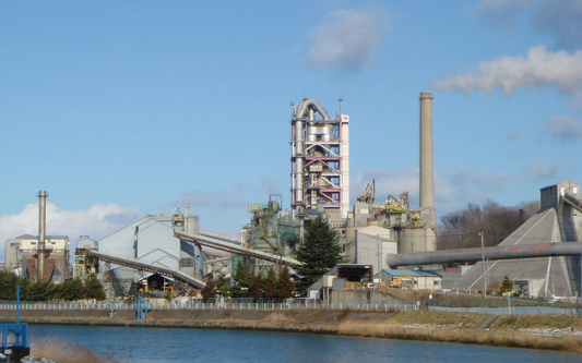 What Makes Hybrid PLC-DCS Essential for Cement Plants?